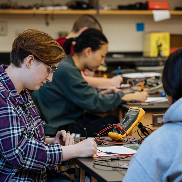 students working in a physics lab