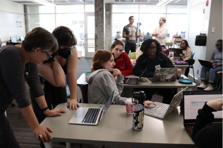 students around laptops at annual Science Sprint