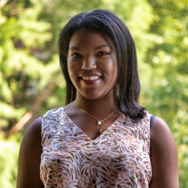 headshot of kendall riley with a natural background